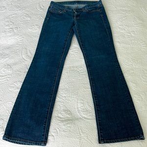 J. Crew low rise bootcut blue jeans.